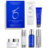 Zo Skin Health by Zein Obagi MD skincare set featuring a blue and white box, a white exfoliating cleanser tube, a blue moisturizing cream tube, a white treatment serum bottle, a blue treatment serum bottle, two silver-toned bottles, and a white jar with a silver lid, all arranged on a white background.